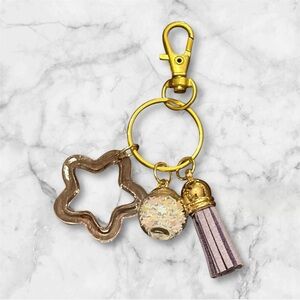 Gold and Purple Star Keychain with Tassel